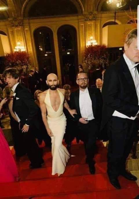 حقيقة صورة رئيس وزراء لوكسمبورغ مع زوجته فى حفل عشاء